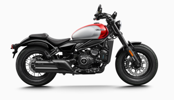 A sleek, modern motorcycle with a black chassis and a red and silver fuel tank, featuring black wheels and exhaust, isolated on a white background.