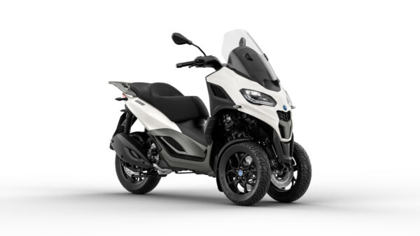 A white and black three-wheeled scooter on a white background.