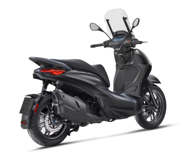 A sleek black scooter with a modern design, showcasing its body, rear wheel, and windshield, positioned at an angle to highlight its profile and features.