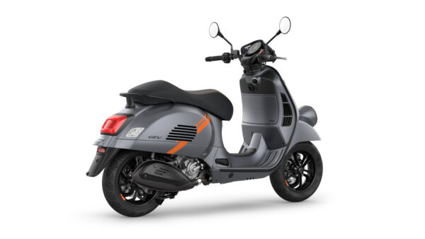 A sleek gray scooter with orange accents, shown from the rear angle, highlighting its rounded design and distinctive rear lights.