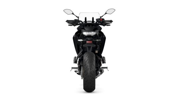 Front view of a sleek, black motorcycle showcasing its handlebars, mirrors, and distinctive tire tread.