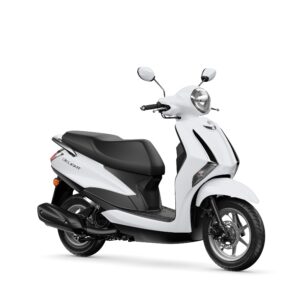 Yamaha 2024 Delight A sleek white scooter with a black seat, featuring a round headlight and two mirrors, positioned at an angle to show its side profile.