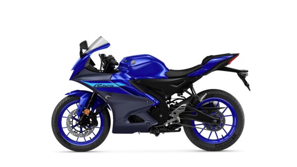 A side view of a blue Yamaha R125 motorcycle, showcasing its sleek design and sporty features, including a prominent front fairing, racing-style seat, and distinctive blue wheels.