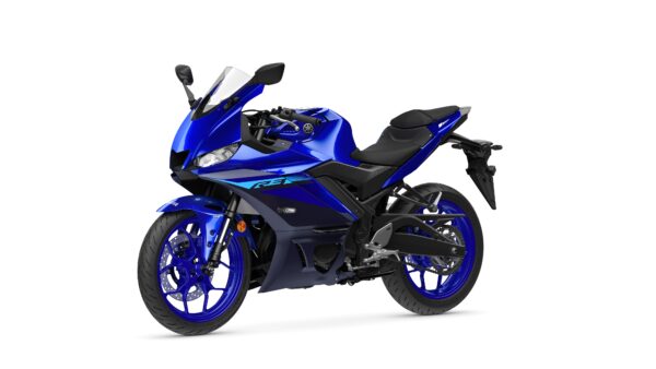 A blue Yamaha motorcycle, model R3, displayed at an angle showing its sleek design, front wheel, and seating area.