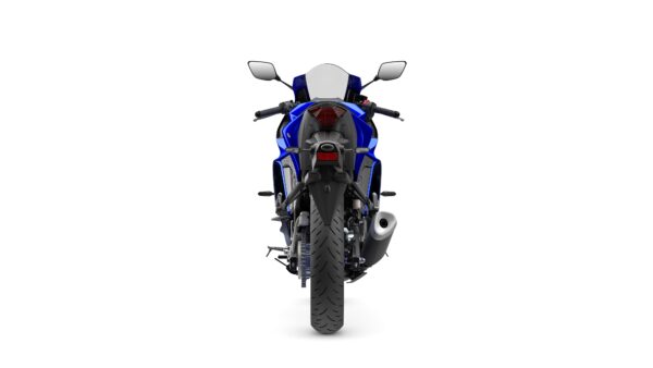 A blue sports motorcycle viewed from the rear, showcasing its sleek design, tail lights, and rear tire.
