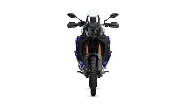 Front view of a blue and black adventure motorcycle with a distinctive headlight, handlebars, and knobby tires, set against a white background.