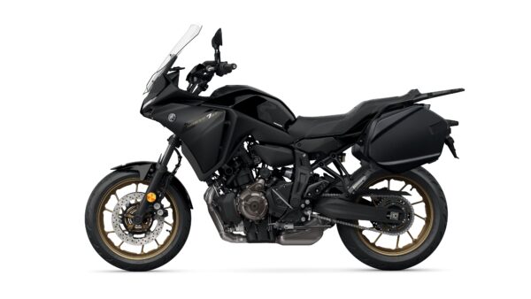A sleek black motorcycle with gold accents, featuring a sporty design and a large windscreen, parked on a white background.