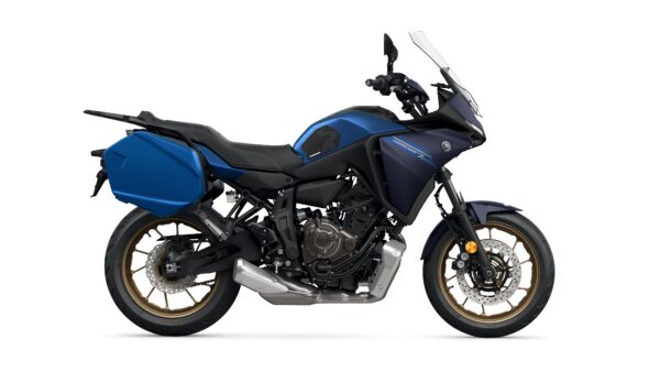 A blue motorcycle with gold wheels and side panniers, positioned on a white background.