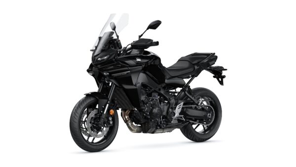 A black touring motorcycle with a sleek design, featuring a windscreen, dual headlights, and a sporty profile, positioned at a slight angle.