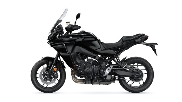 A black touring motorcycle with a sleek design, featuring a large windshield, adjustable seat, and prominent engine details, positioned against a white background.