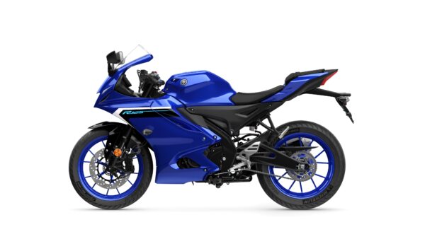 A blue sport motorcycle with a sleek design, featuring a fairing, sporty seat, and alloy wheels with blue accents.