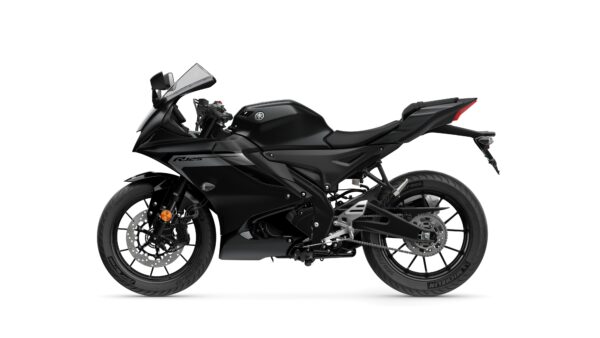 A sleek, black Yamaha R125 motorcycle is displayed from the side, featuring angular bodywork, a sporty design, and distinct wheels.