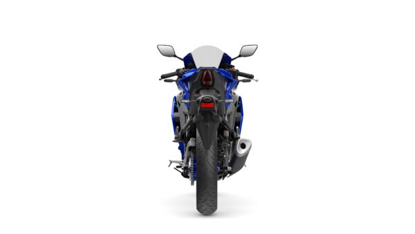 Rear view of a blue sports motorcycle, displaying the tail light, mirrors, and exhaust pipe against a white background.