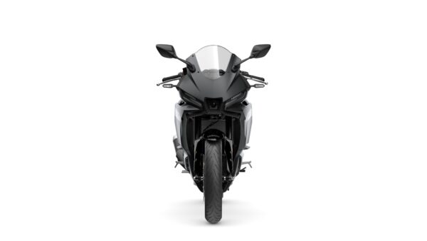 A sleek black and silver motorcycle facing forward, showcasing its aerodynamic design, headlights, and detailed front components against a white background.