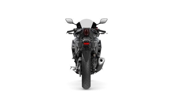 A sleek motorcycle viewed from the rear, showcasing its taillight, exhaust pipe, and aerodynamic design against a white background.