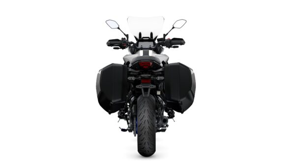 A rear view of a motorcycle with panniers, featuring a sleek design and a prominent rear tire, set against a white background.