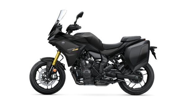 A sleek, black sport-touring motorcycle with a prominent windscreen, streamlined body, and integrated side panniers. The bike features gold front forks and is positioned on a white background.