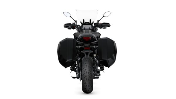 A black motorcycle seen from the rear, featuring side panniers, a sleek tail light, and a prominent windshield. The background is a plain white.