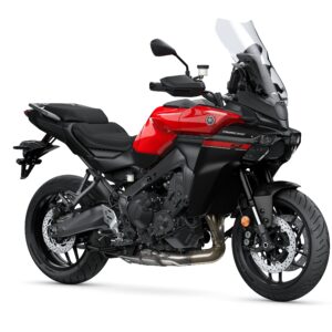 Yamaha 2025 Tracer 9 A sleek red and black Yamaha motorcycle, featuring a modern design with a large windscreen, comfortable seating, and sporty wheels, displayed against a white background.
