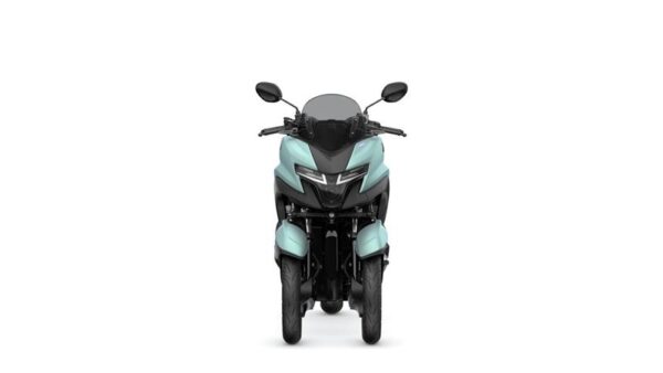 A front view of a light blue three-wheeled motorcycle, featuring a modern design with a sleek body, twin headlights, and a windscreen.