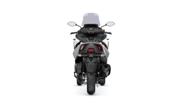 A rear view of a modern motorcycle with a sleek design, featuring a clear windshield, dual mirrors, and an integrated tail light. The motorcycle is positioned against a plain white background.
