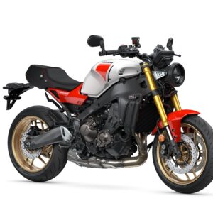 Yamaha 2025 XSR900 A modern motorcycle with a silver and red body, gold wheels, and a sleek design, displayed against a white background.