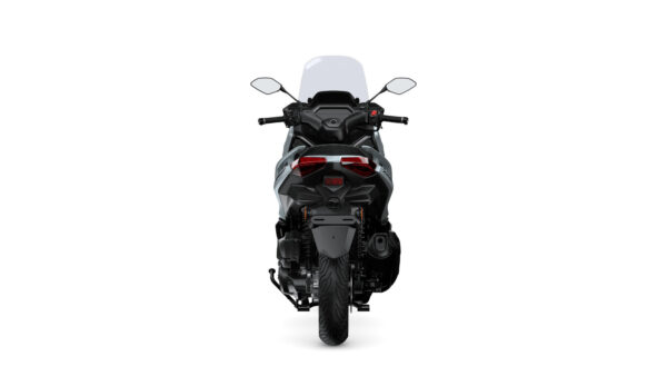 A rear view of a motorcycle with a prominent windshield, modern design, and reflective tail lights against a white background.