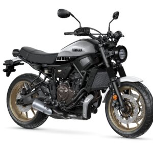 Yamaha 2023 XSR 700 Legacy motorcycle in metallic silver and black, featuring a minimalist design, round headlight, and gold-accented wheels.