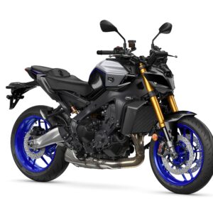 Yamaha 2024 MT-09 SP A modern motorcycle with a sleek design, featuring a metallic gray body, blue wheels, and gold front forks, positioned on a white background.
