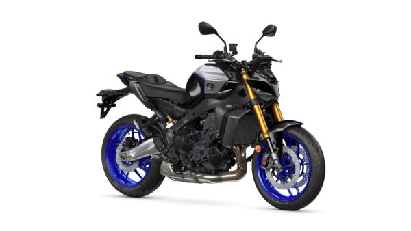 Yamaha 2024 MT-09 SP A modern motorcycle with a sleek design, featuring a metallic gray body, blue wheels, and gold front forks, positioned on a white background.