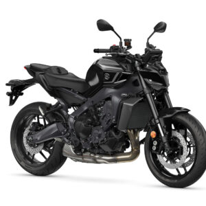 Yamaha 2024 MT-09 Y-AMT A sleek black motorcycle with a modern design, showcasing an exposed engine, sporty frame, and dual disc brakes. The bike features a low-profile seat and is positioned at a slight angle, highlighting its aggressive stance.
