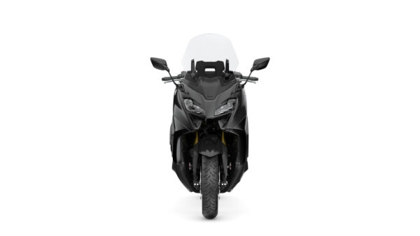 Front view of a sleek black motorcycle with a large windshield and dual headlights, set against a white background.