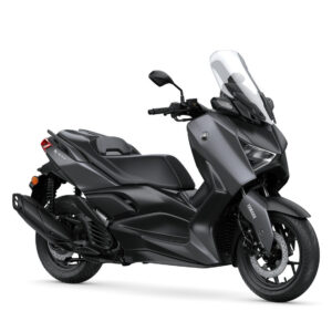 Yamaha 2024 XMAX 300 A sleek black Yamaha XMAX scooter is shown at a slight angle, showcasing its modern design, large windscreen, and comfortable seating. The bike features sporty lines, a prominent front headlight, and a robust rear wheel.