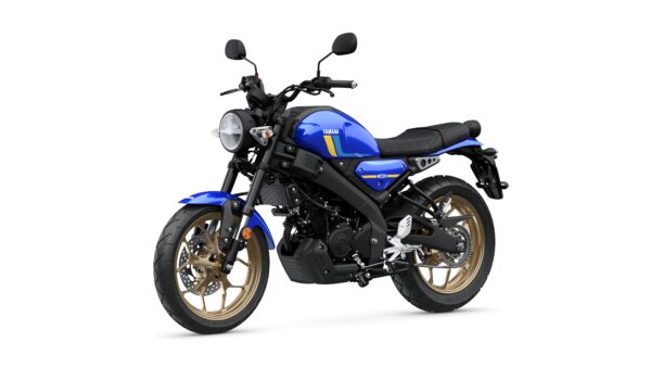 A blue Yamaha motorcycle with gold alloy wheels, featuring a round headlight, black seat, and sleek design, positioned on a white background.