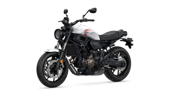 A sleek white and black Yamaha motorcycle with a modern design, featuring a round headlight, minimalist body, and sport-style tires.