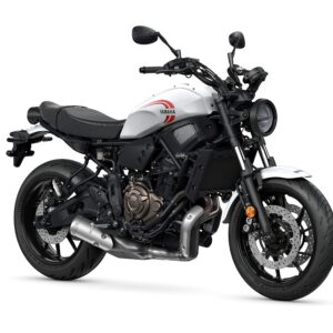 Yamaha 2024 XSR 700 A modern motorcycle with a white and black color scheme, featuring a prominent Yamaha logo, low-profile seat, and sleek design elements, positioned at an angle to showcase its features.