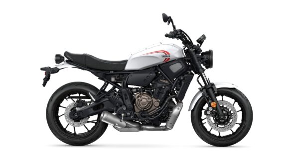 A sleek, modern motorcycle in white with black accents, featuring a prominent Yamaha logo, a low-slung seat, and dual exhaust pipes, viewed from the side.