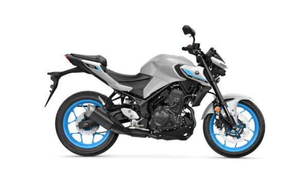 A side view of a gray Yamaha motorcycle with blue accents, showcasing its sleek design and modern features.