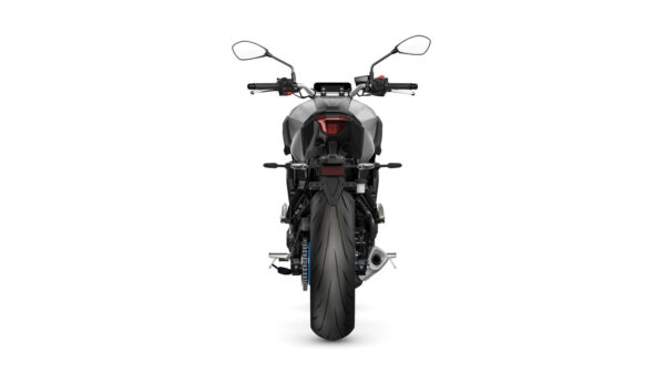 A sleek motorcycle viewed from the rear, showcasing its modern design, large rear tire, and distinctive tail light against a white background.