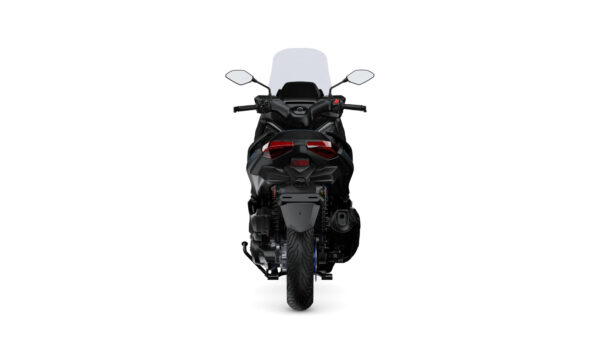 A rear view of a sleek, modern motorcycle with a black finish, featuring a high windshield, dual tail lights, and a prominent rear tire.