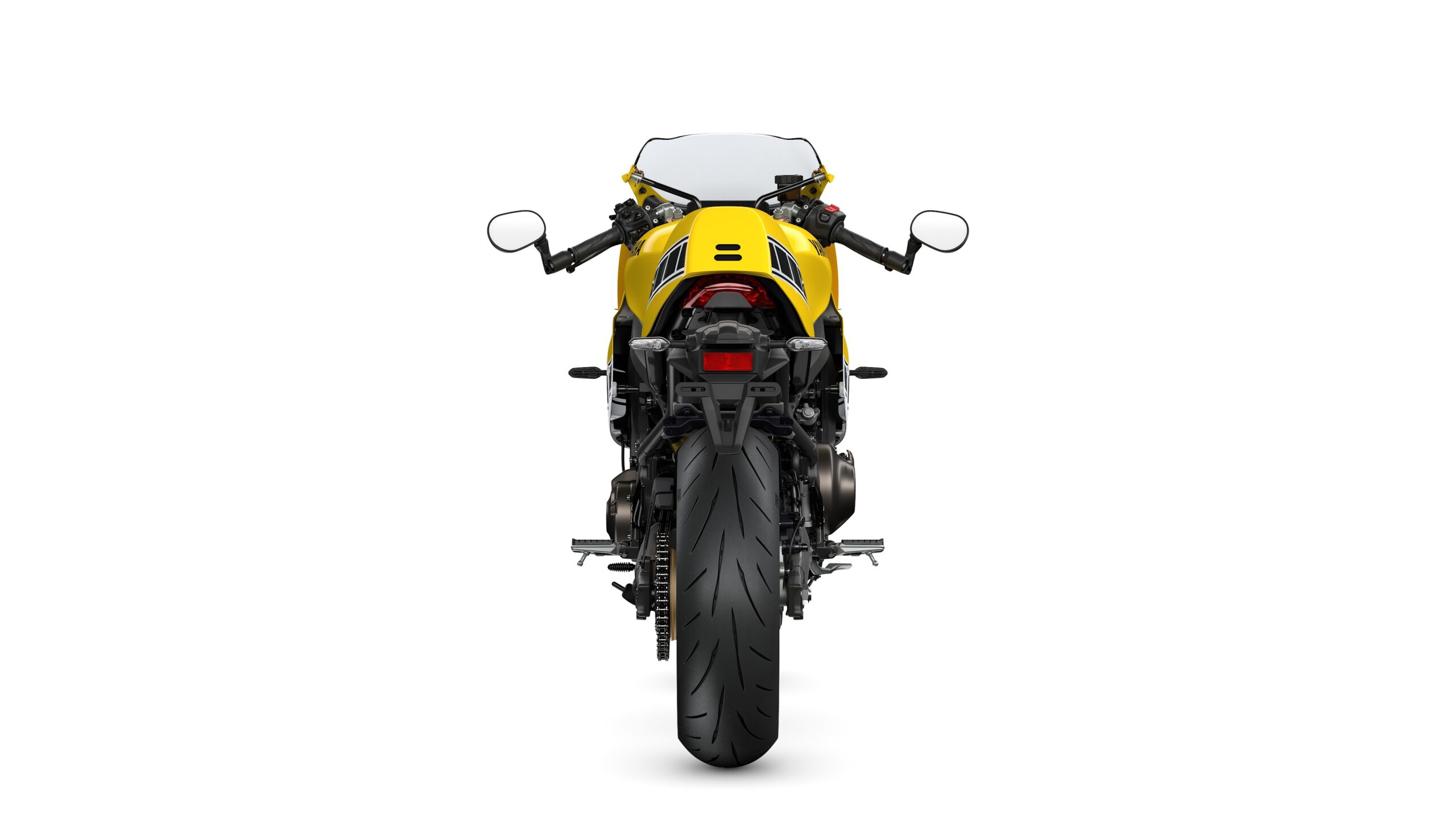 Yamaha 2026 XSR900 GP Legend Yellow - Rear A rear view of a yellow motorcycle with a sleek design, showcasing the tail light, handlebars, and large rear tire against a white background.