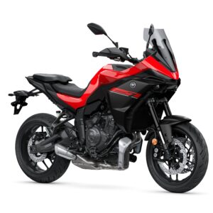 Yamaha 2026 Tracer 7 A sleek red and black motorcycle with a sporty design, featuring a fairing, windscreen, and dual headlights, parked on a white background.