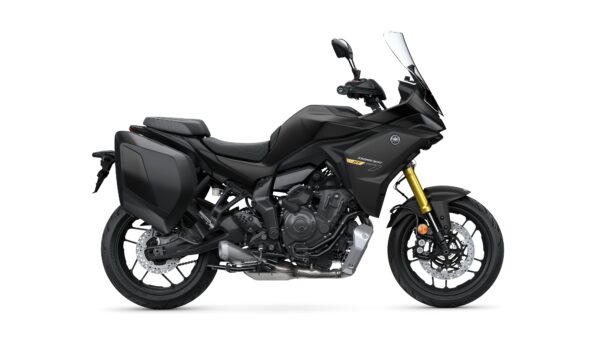 A black motorcycle with a streamlined design, featuring a tall windscreen, side luggage, and an exposed engine, set against a white background.