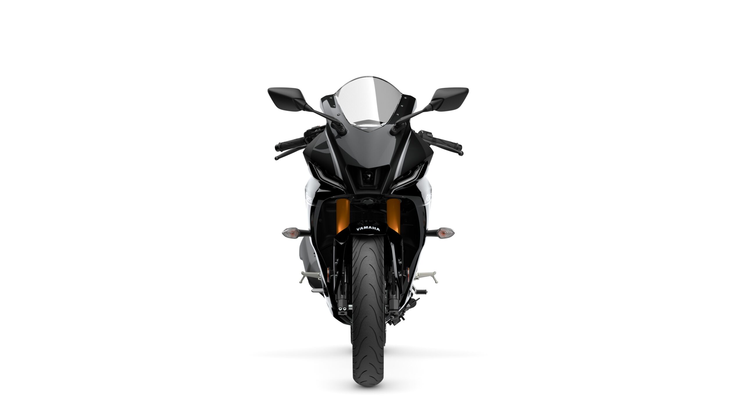 2026 Yamaha R125 Tech Black Front A front view of a sleek, modern motorcycle with a black and white color scheme, featuring sharp lines, a clear windshield, and illuminated accents. The motorcycle's front tire is prominently displayed, alongside stylish side mirrors and a bold brand logo.