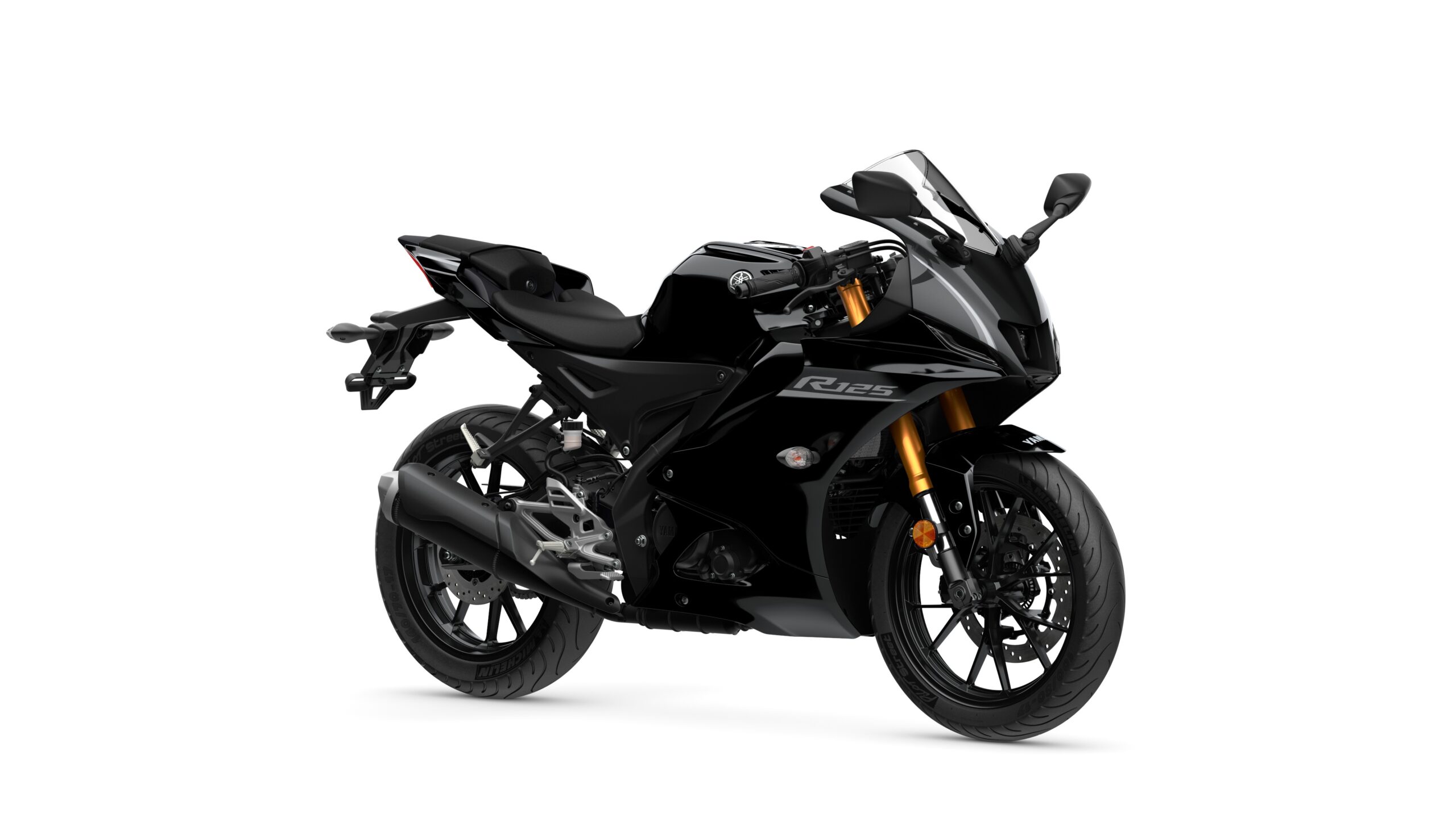 2026 Yamaha R125 Tech Black Lateral Right A sleek black sports motorcycle with gold accents, featuring a streamlined design and sporty posture, positioned at a slight angle against a white background.