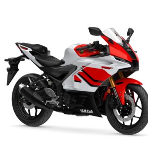 Yamaha 2026 R3 Anniversary Edition A sleek, modern Yamaha motorcycle with a white and red color scheme, featuring sport bike styling, a fairing, and a prominent front headlight.