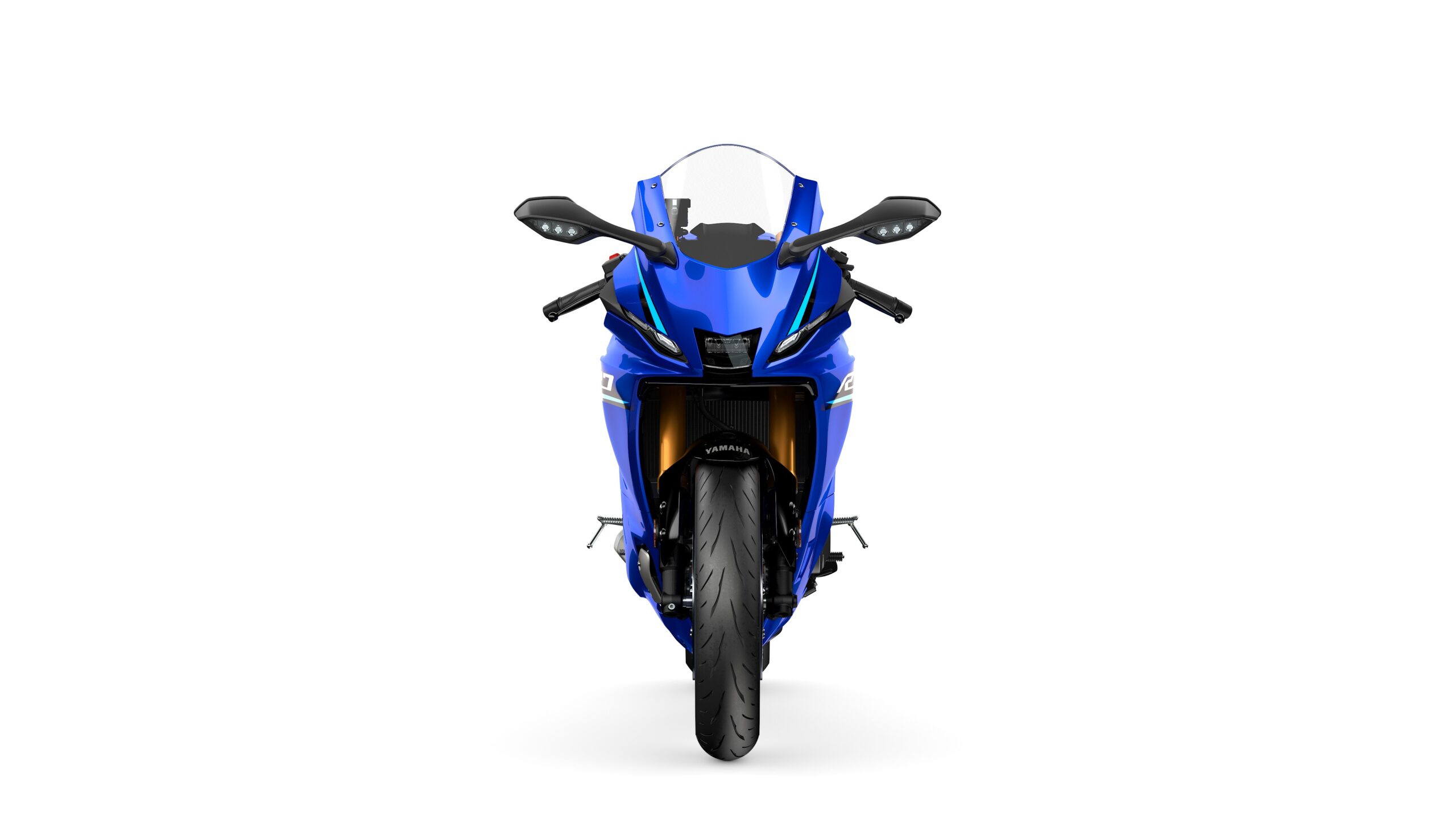 2026 Yamaha R7 Icon Blue Front A blue sports motorcycle viewed from the front, showcasing its streamlined design, sharp headlights, and large front tire against a white background.