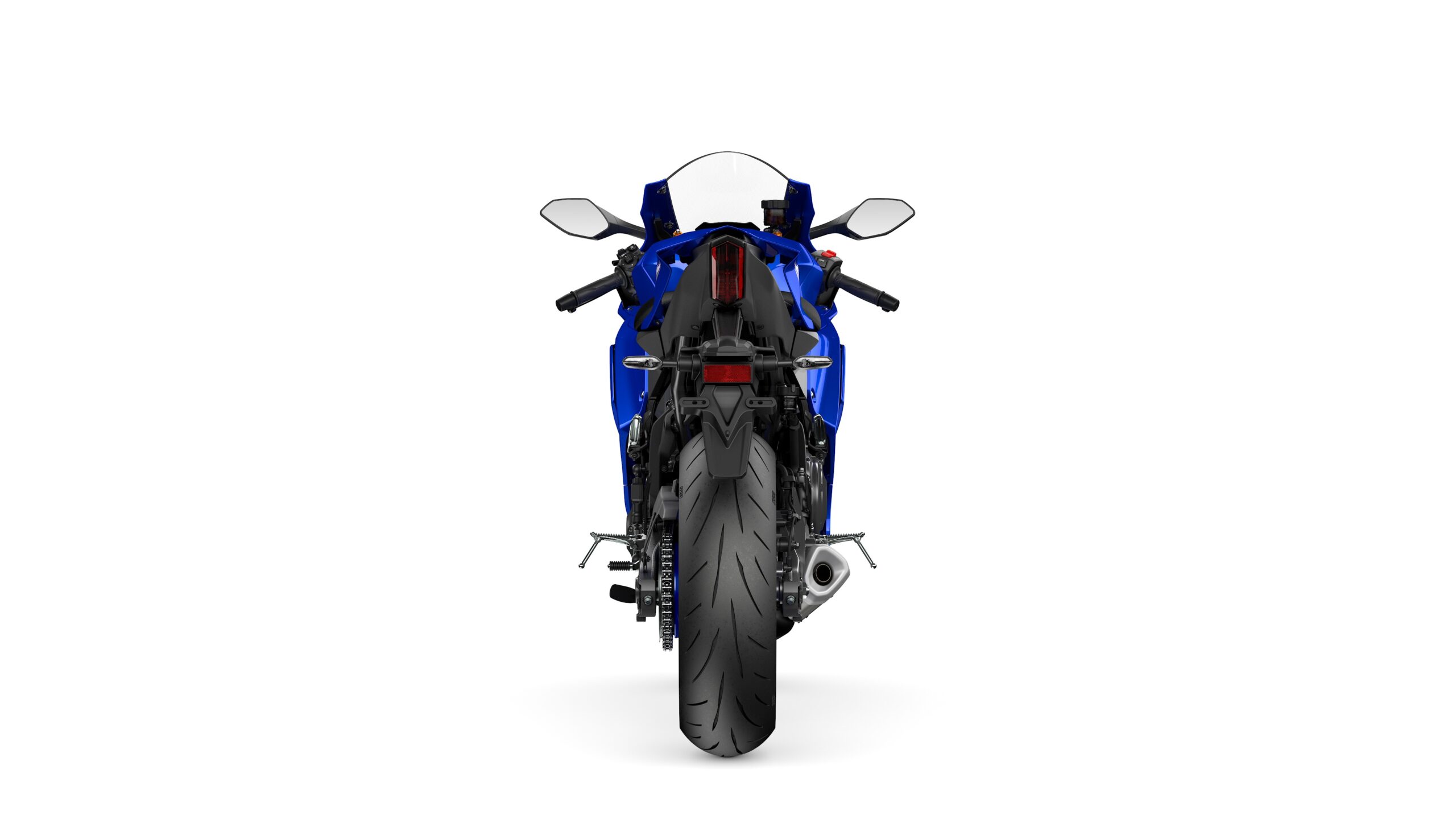 2026 Yamaha R7 Icon Blue Rear A motorcycle viewed from the rear, showcasing a blue body, dual exhaust, and thick rear tire, set against a white background.