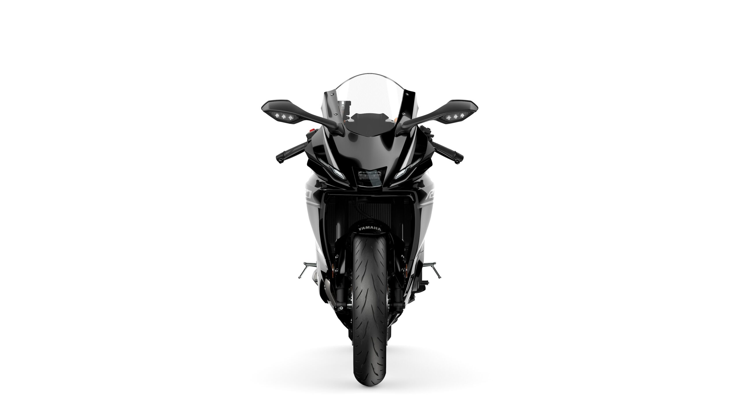 2026 Yamaha R7 Midnight Black Front A black motorcycle viewed from the front, featuring a sleek design with a windscreen, dual headlights, and prominent mirrors. The front tire is clearly visible, set against a white background.
