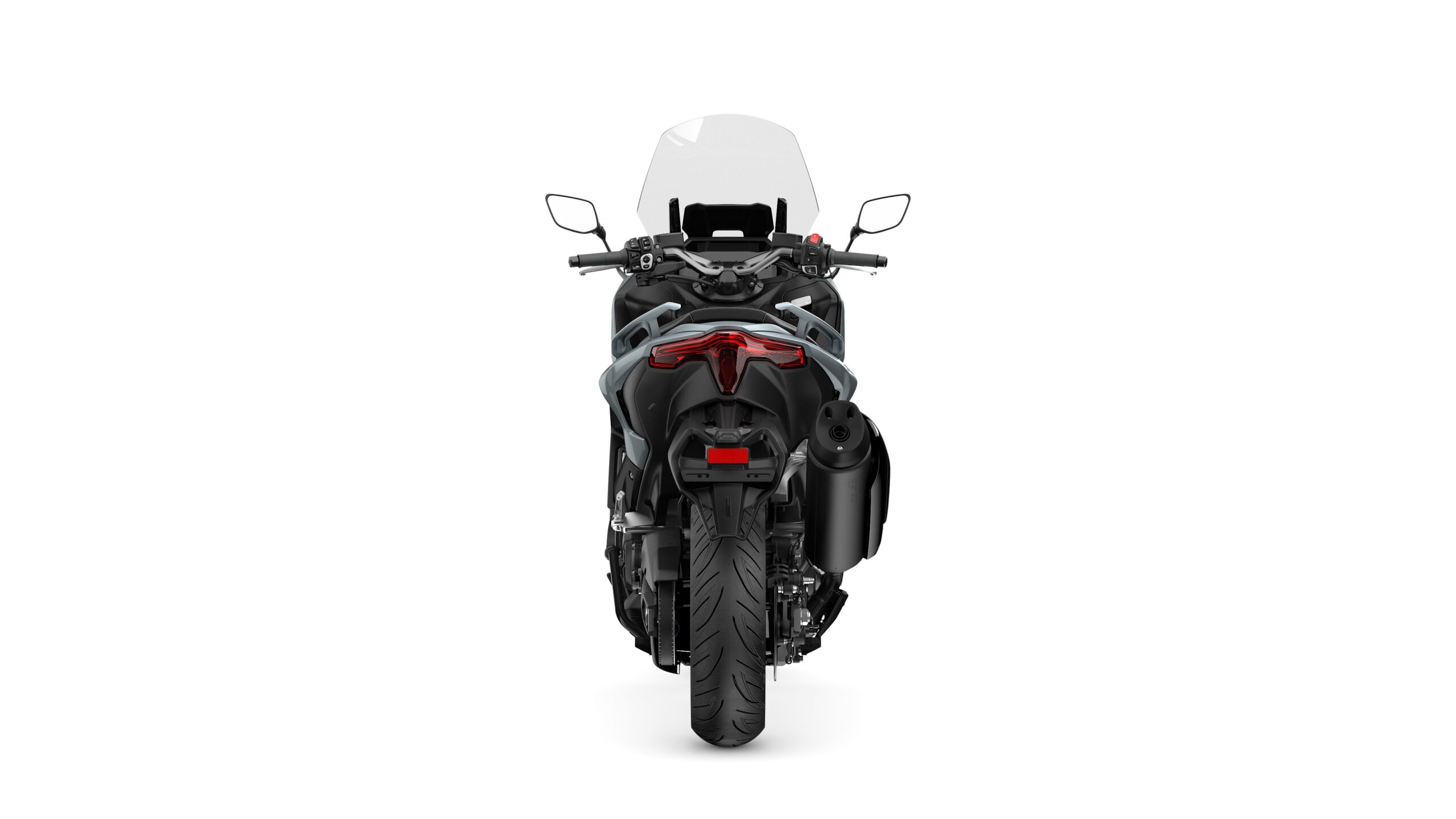 2026 Yamaha TMAX TECH MAX Ceramic Grey Rear A rear view of a black motorcycle with a clear windscreen, LED taillight, and dual exhaust. The motorcycle features a thick rear tire and is set against a white background.